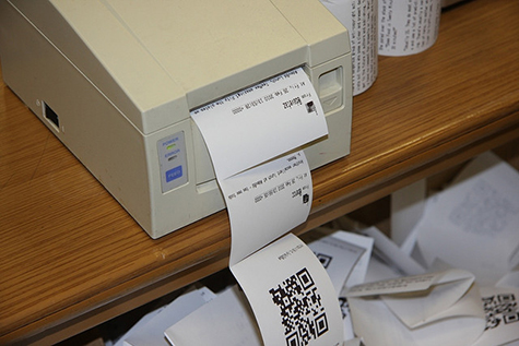 Receipt printer with box of receipts
