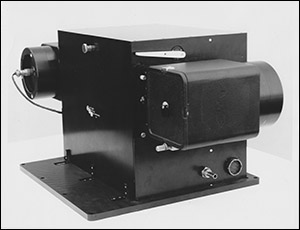 High precision camera - black box with enclosed reels on each side.
