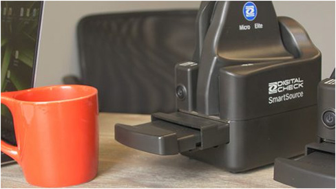 RDC scanner next to coffee mug